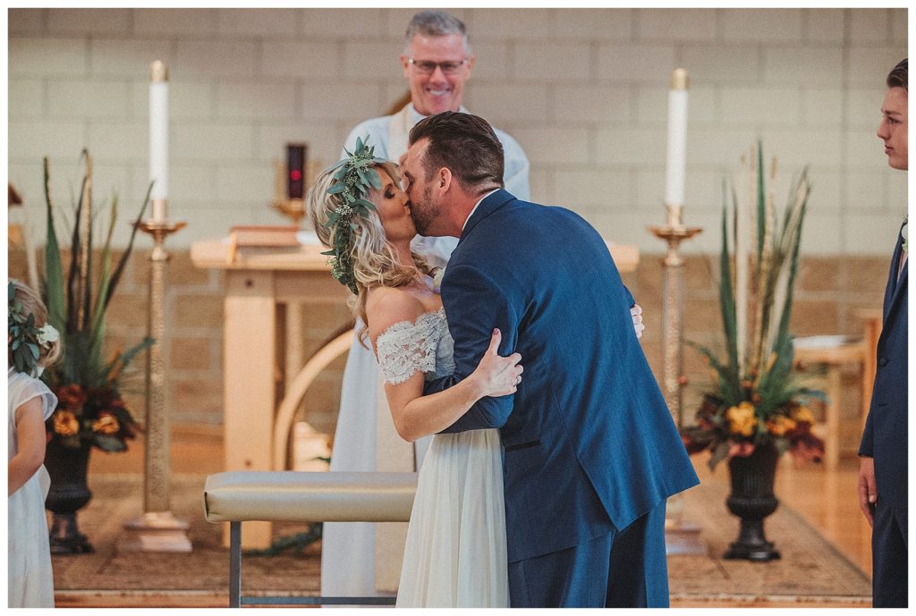 the first kiss at the alter