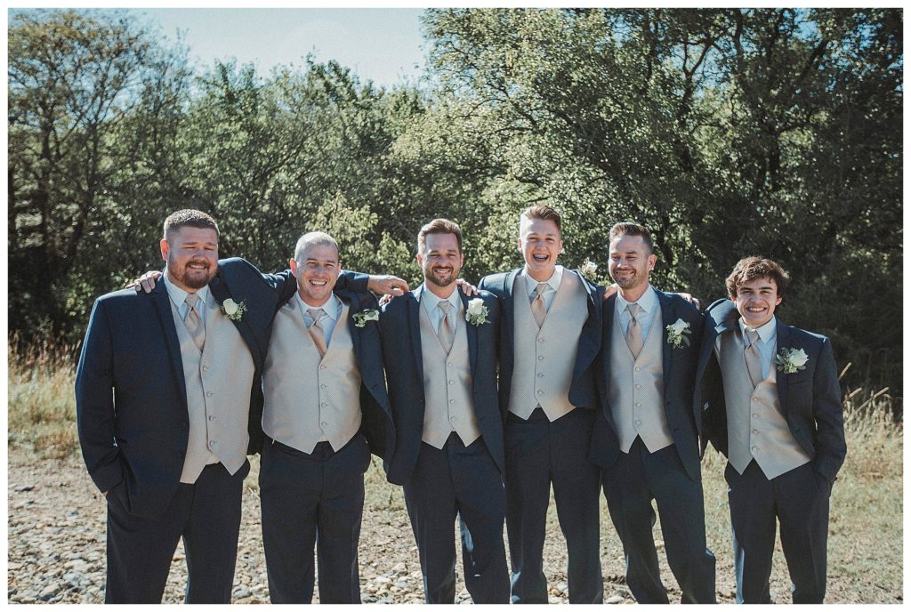 groom and groomsmen on the farm