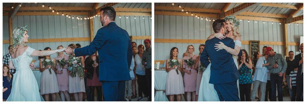 bride and grooms first dance in barn
