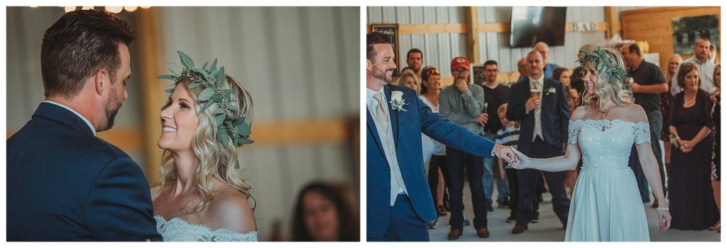 bride and grooms first dance in barn