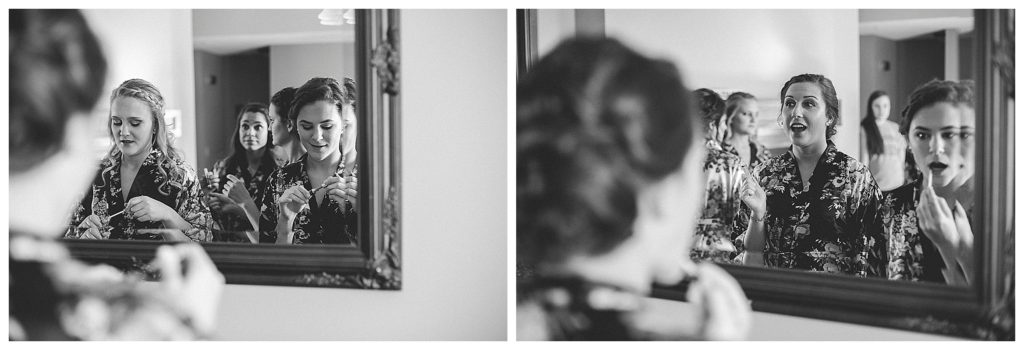 bridesmaids looking in mirror