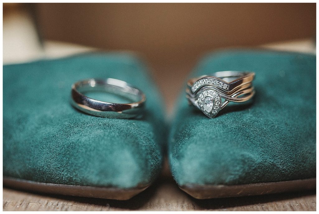 wedding rings on green shoes