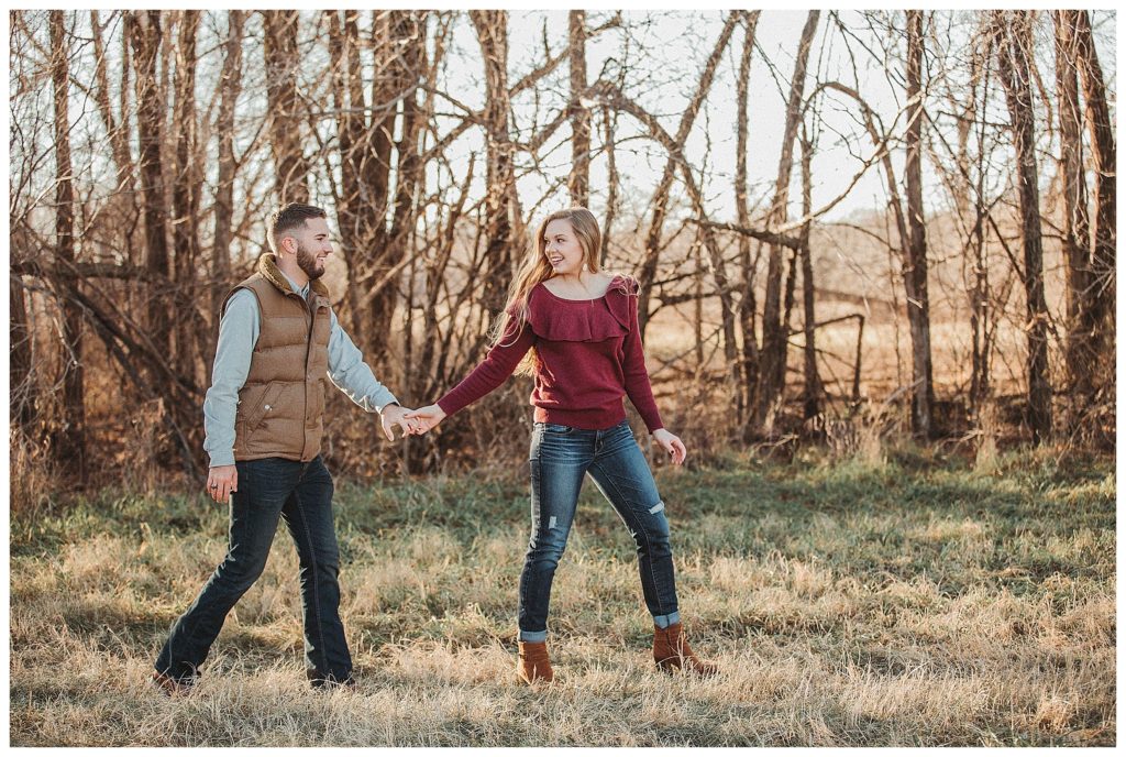 couple walking together holding hands