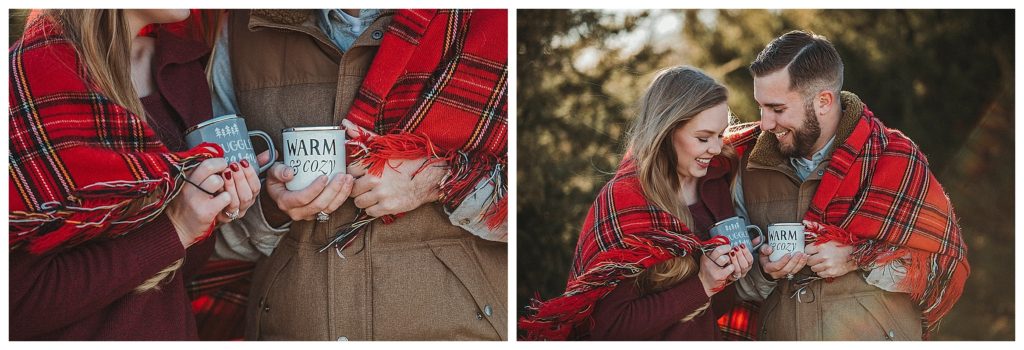 couple snuggling outside wrapped in blanket with coffee mugs