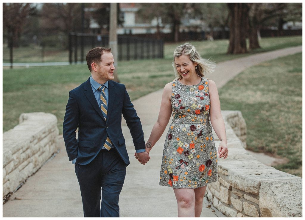 bride and groom walking holding hands