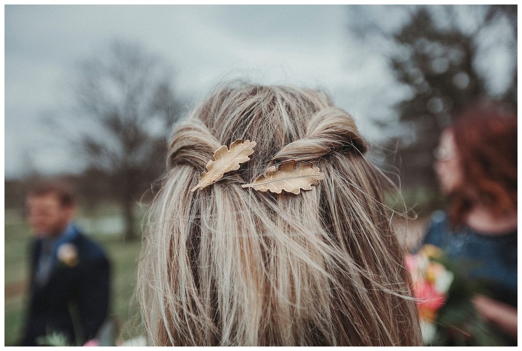 brides hair with gold leaf breats
