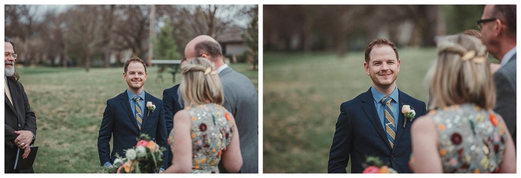 groom shows emotion as his bride walks down the isle