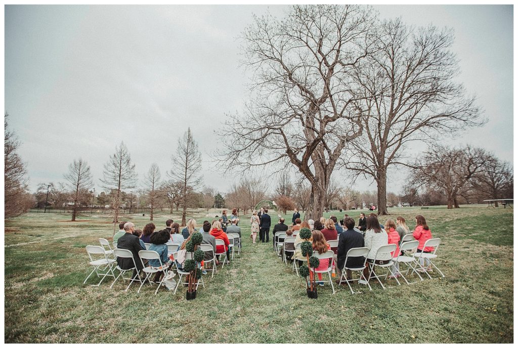 wide shot of the ceremony from behind