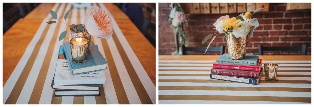 books stacked with flowers in vases as center pieces